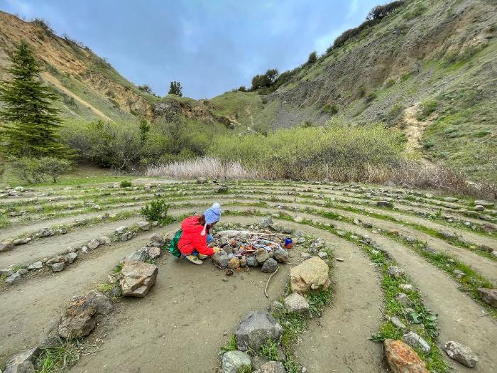 Kid in the center of Sibley Volcanic Regional Preserve’s Labyrinth