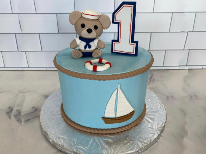 first birthday cake with a bear on it