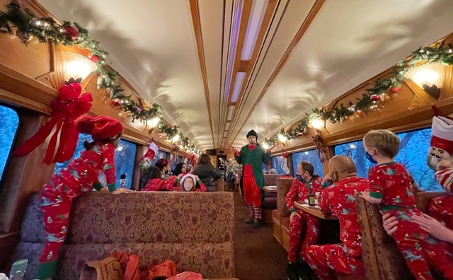 kids and santa on a holiday train