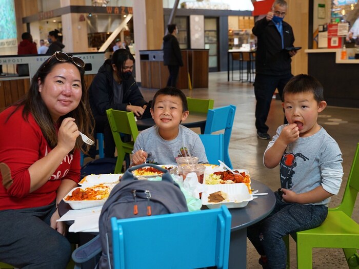 Family eating dinner in kid friendly seating