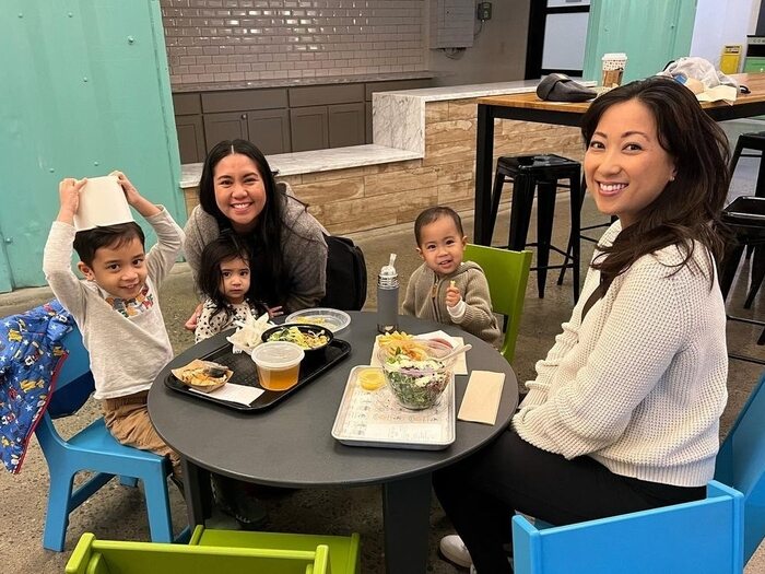 Family eating out at food court in emeryville