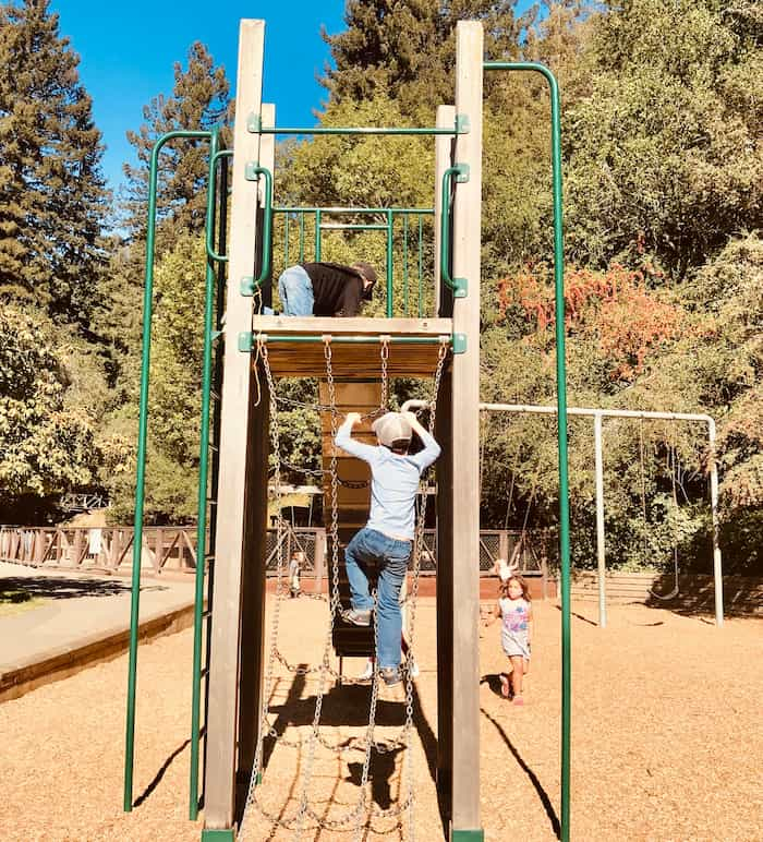 child climbing play structure